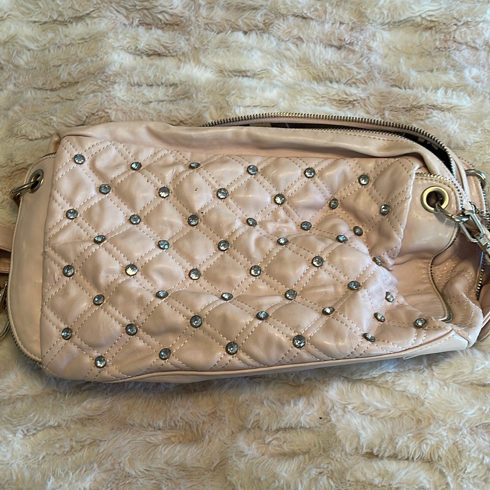 Soft creamy pink purse by Ailubao.  Does show some wear by the buckle.